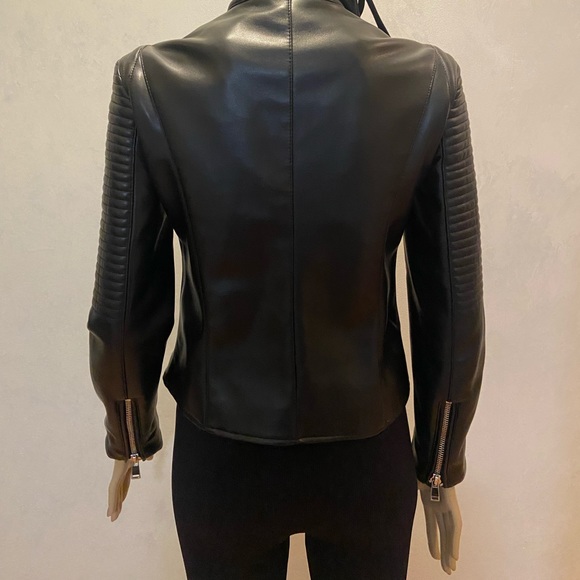 Faux leather this is a pleather jacket. - Picture 6 of 8